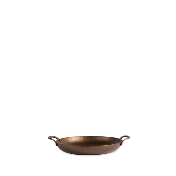 https://www.heathceramics.com/cdn/shop/products/SM-100CarbonSteelRoundRoaster_grande.jpg?v=1667248375